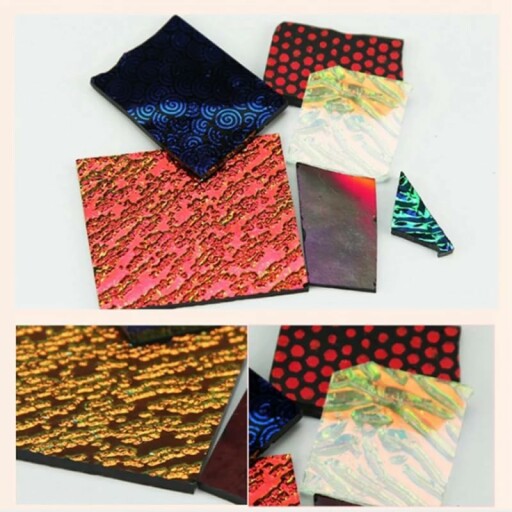 Assorted dichroic glass pieces in vibrant colors.