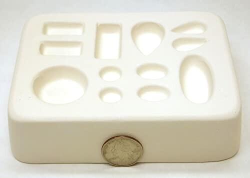 White ceramic jewelry mold with various shapes