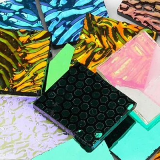 A variety of colorful mosaic tiles with different patterns and textures.