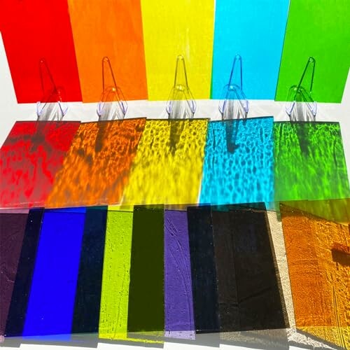 Various colorful transparent sheets displayed in rows.
