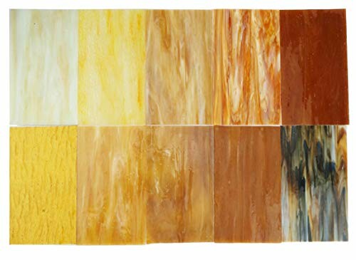 Assorted stained glass sheets in various colors and patterns